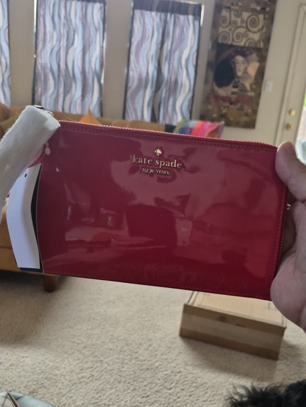 kate spade glossy patent zip wristlet in red